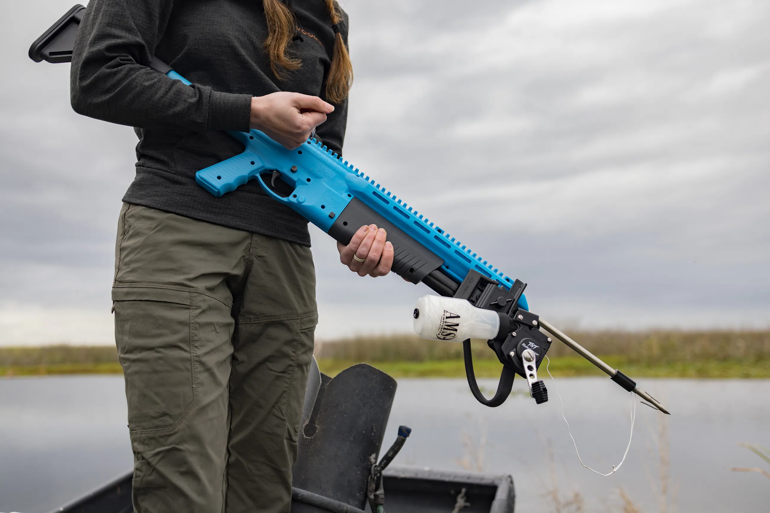 Abby Casey bowfishing with the Umarex FishR